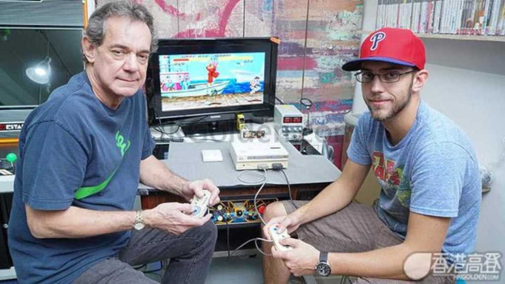 Terry and Daniel Diebold demonstrate the working Nintendo PlayStation console