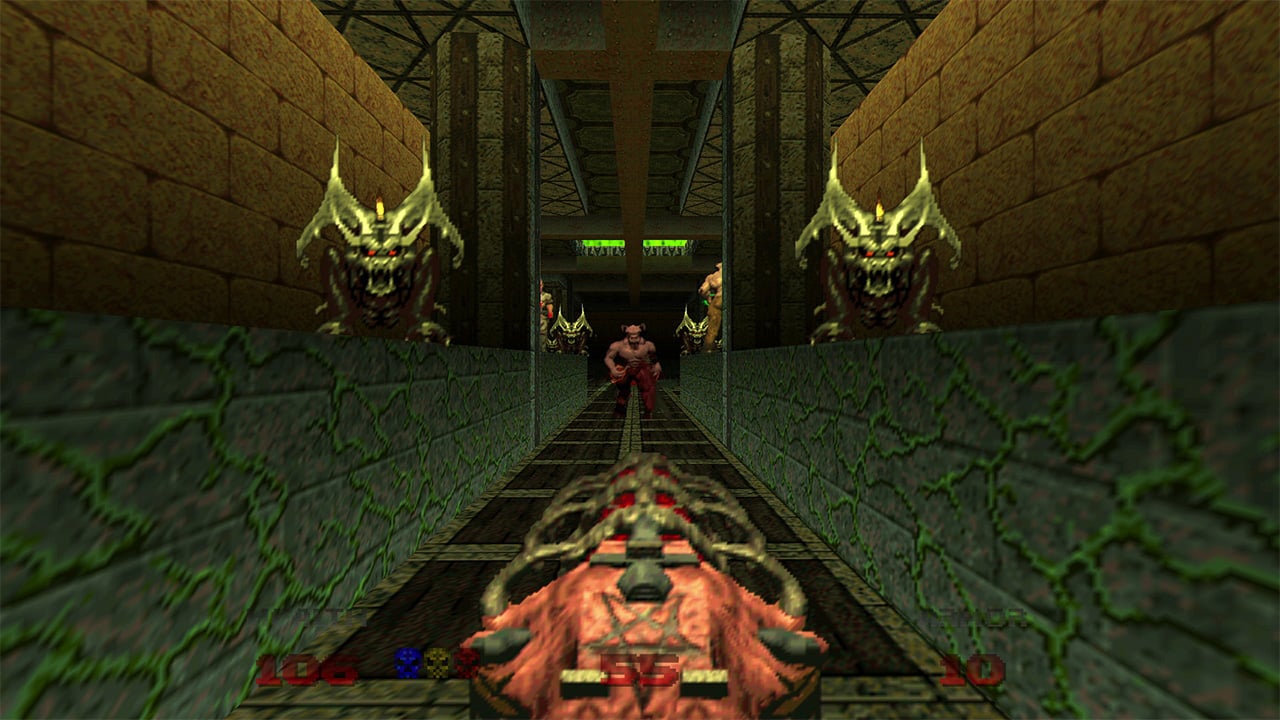 A player fights enemies in a narrow passageway in Doom 64, one of the top ten Doom games in the franchise.