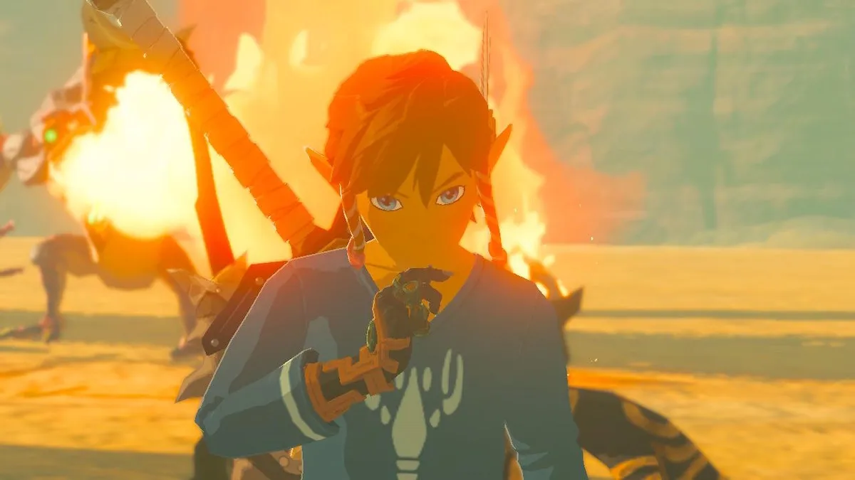 Link standing in front of a Fire Breath Lizalfos breathing fire in The Legend of Zelda: Tears of the Kingdom.