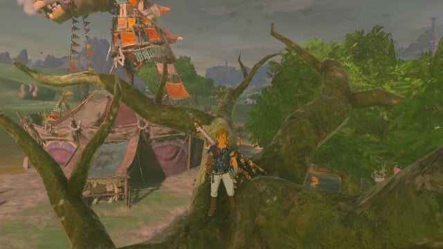 Link in tree beside Riverside Stable in The Legend of Zelda: Tears of the Kingdom.