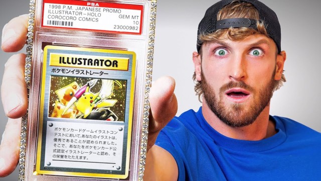 Logan Paul holding the Pikachu Illustrator card.