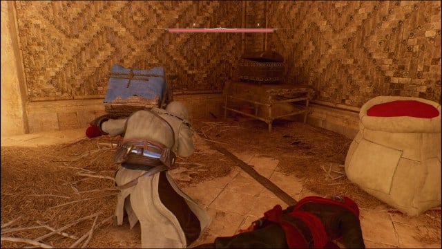 Basim carrying goods in Assassin's Creed Mirage.