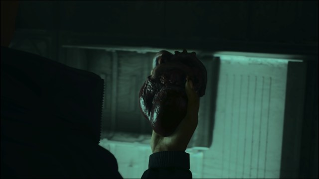 Saga Anderson holding heart in general store in Alan Wake 2.