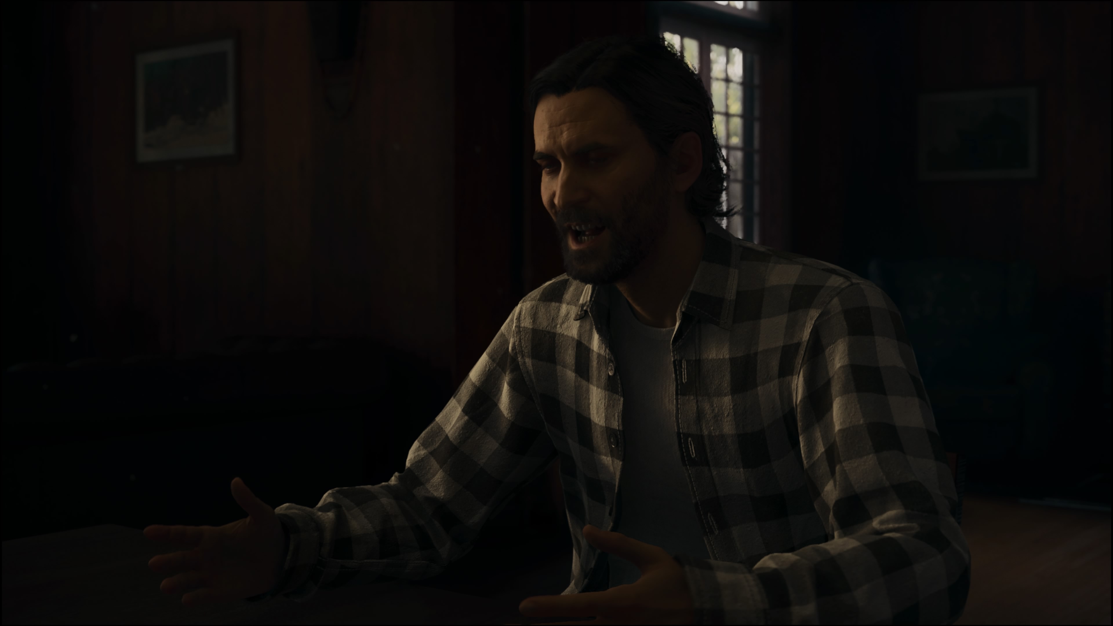 Alan Wake sitting in Alan Wake 2.