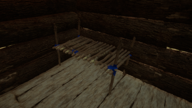 A simple wooden bed in Sons of the Forest. Approaching the bed and holding one button to Save. 
