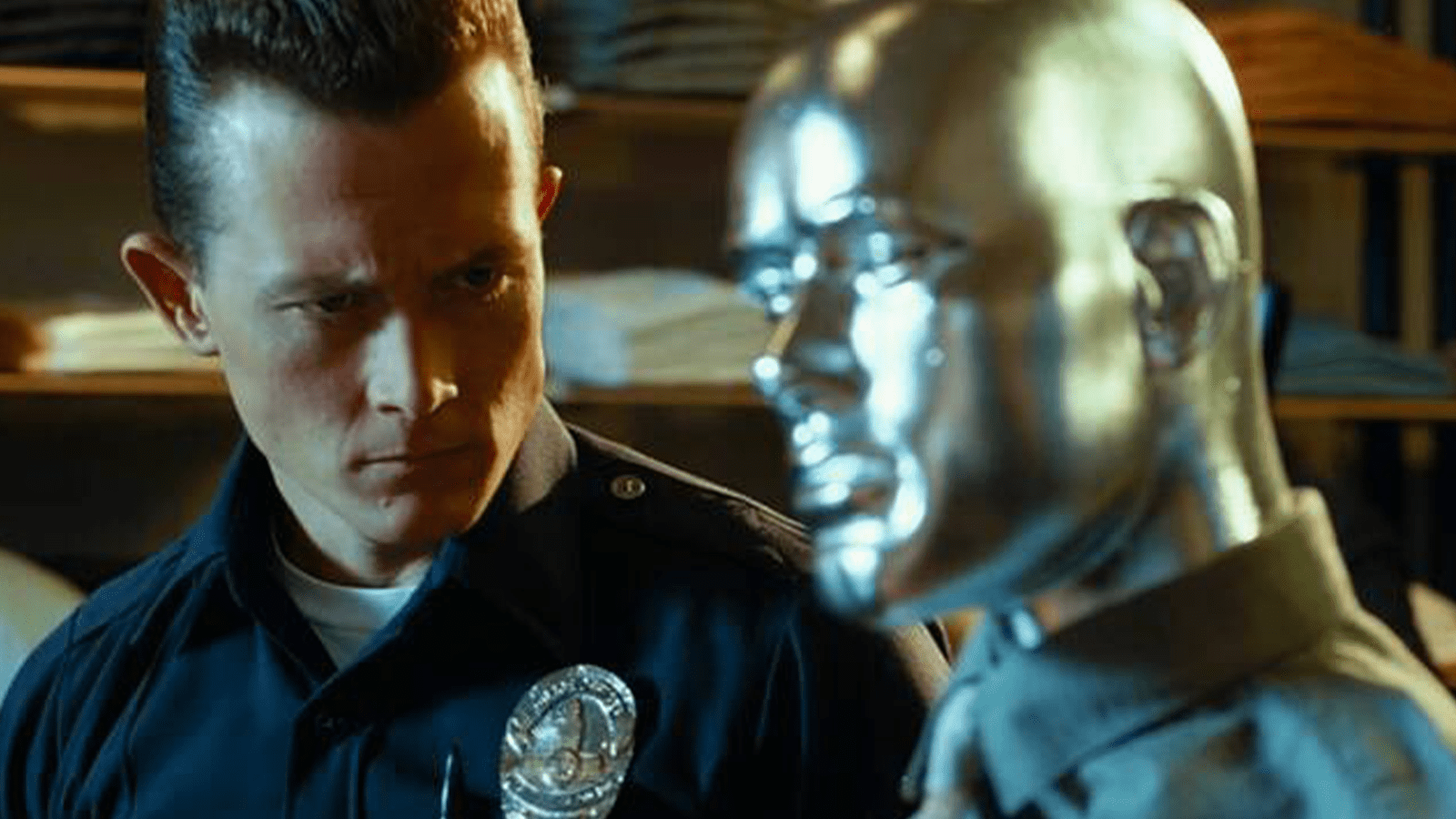 T-1000 looking at a shiny metal dummy