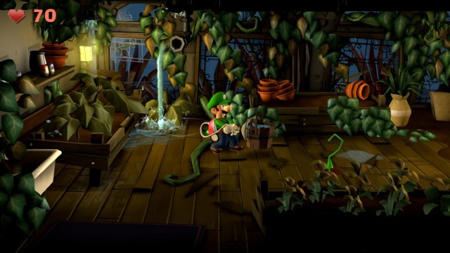 Luigi's Mansion 2 HD Llevando un cubo.