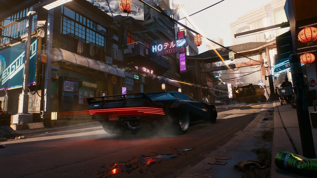 Cyberpunk 2077: a slick car zooms through a street.