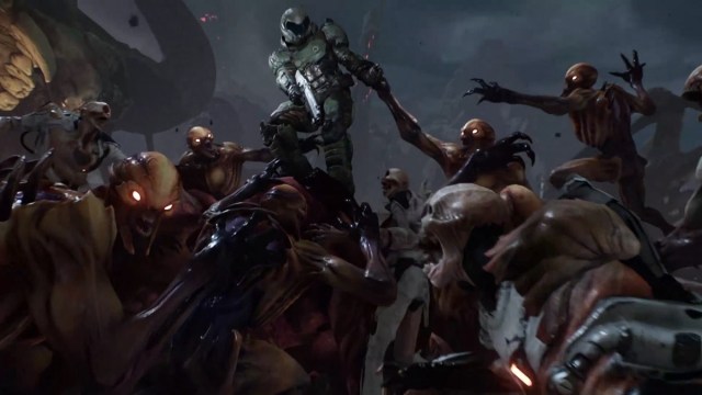 Doom 2016: the Doom Slayer is swamped by a horde of Imps.