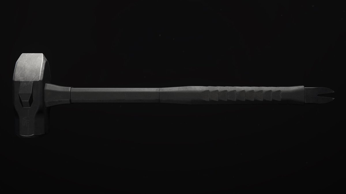 A sledgehammer against a black background