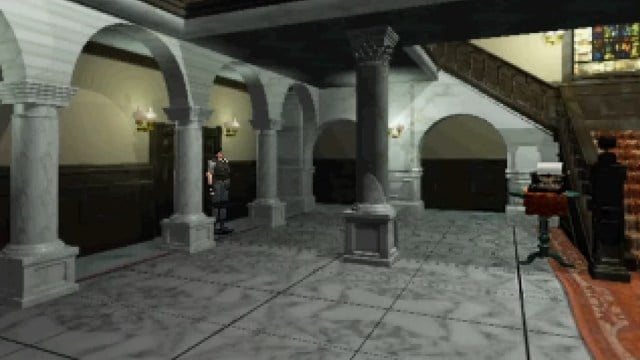 Resident Evil: Chris Redfield stands in the main entrance of the Spencer Mansion.