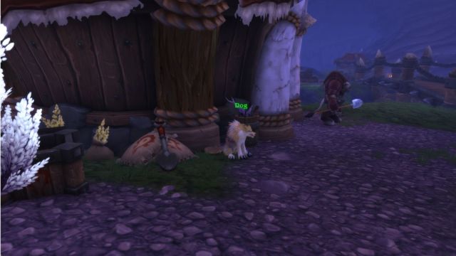 Your Dog sitting in front of a hut in your Garrison