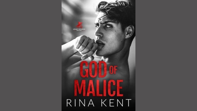 The cover of God of Malice; a man wiping his lips