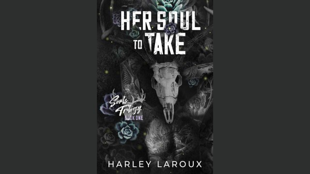 the cover of Her Soul to Take; a deer skull surrounded by plants