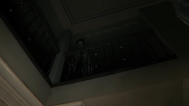 Lisa staring at the player from above in PT