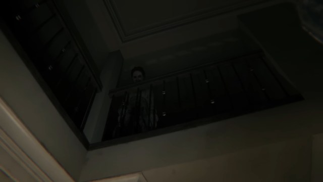 Lisa looks at the player from above in PT