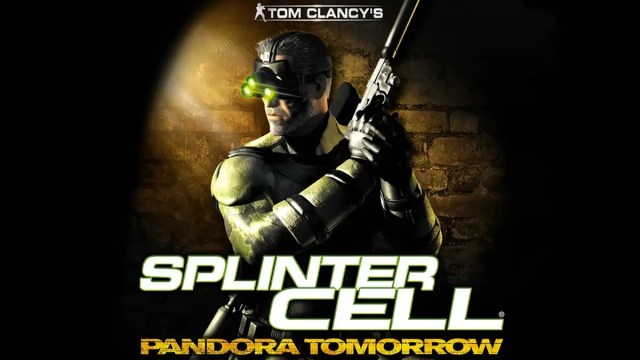 Splinter Cell Pandora Tomorrow: Sam Fisher holds a silenced pistol as a spotlight illuminates him.