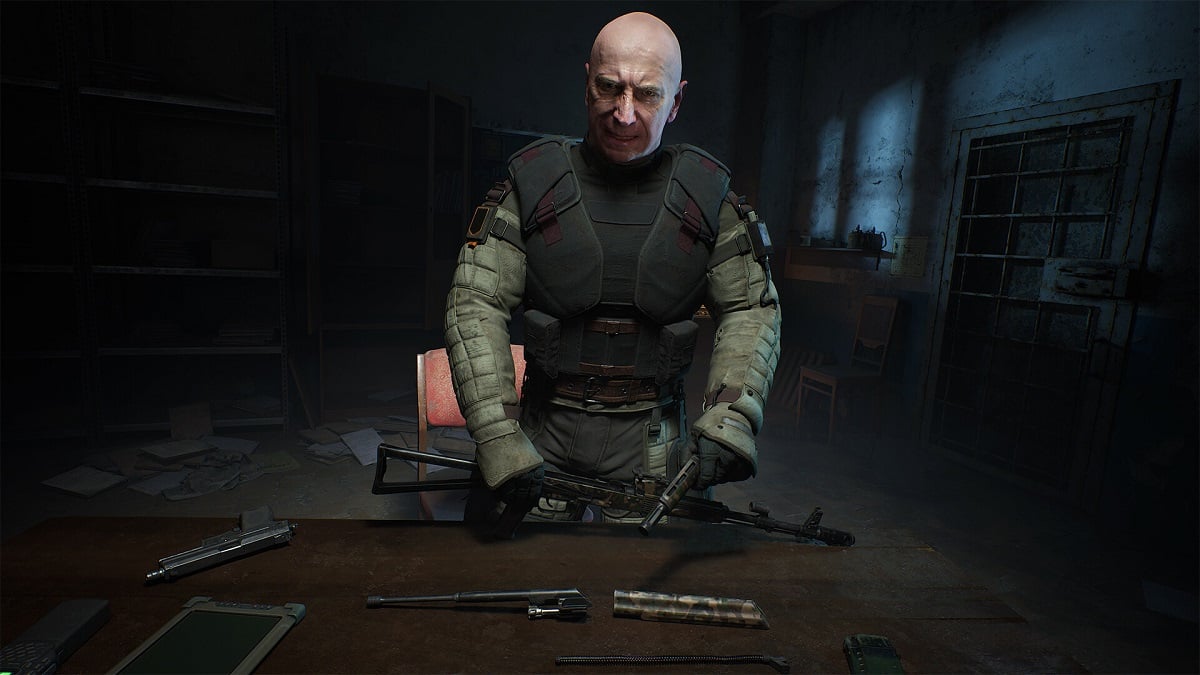STALKER 2: a bald military man holds some guns while looking very stern.