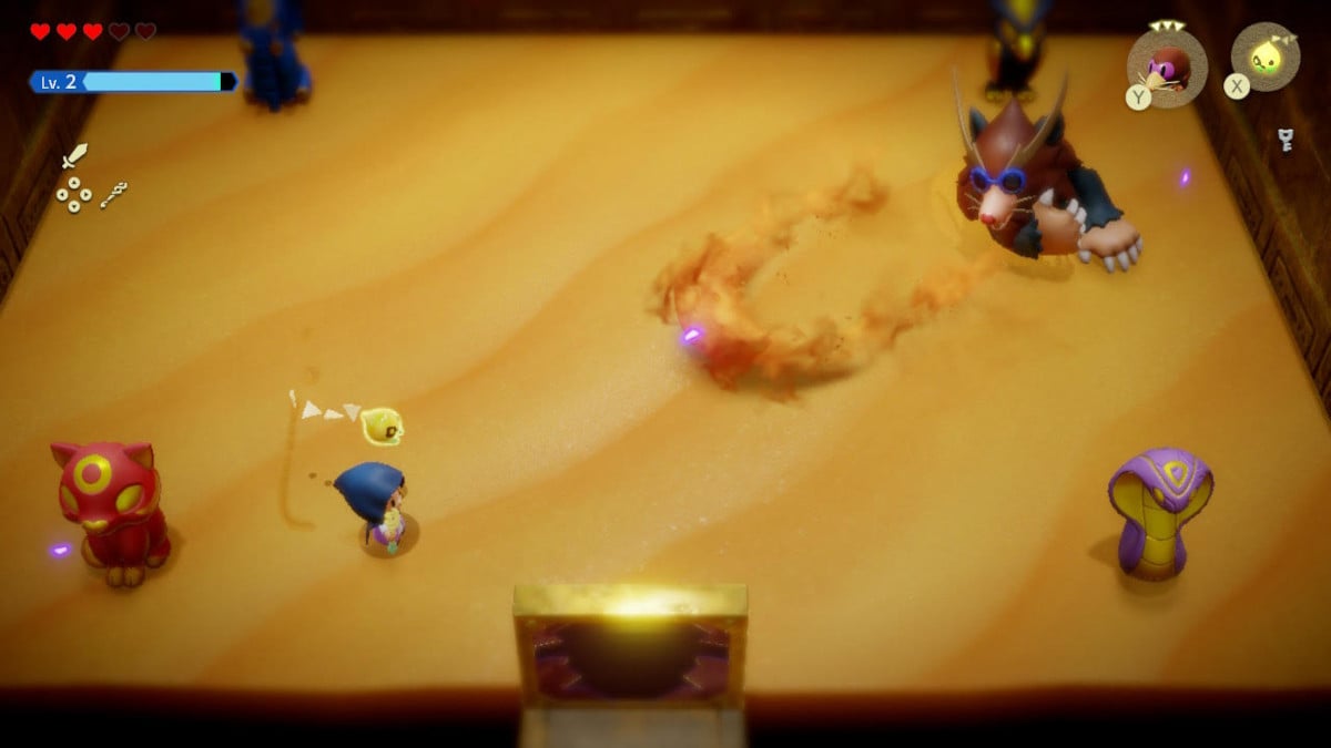 Morgypth attacks Zelda with a shockwave of sand.