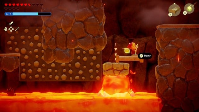 Zelda: Echoes of Wisdom bedriding over lava.