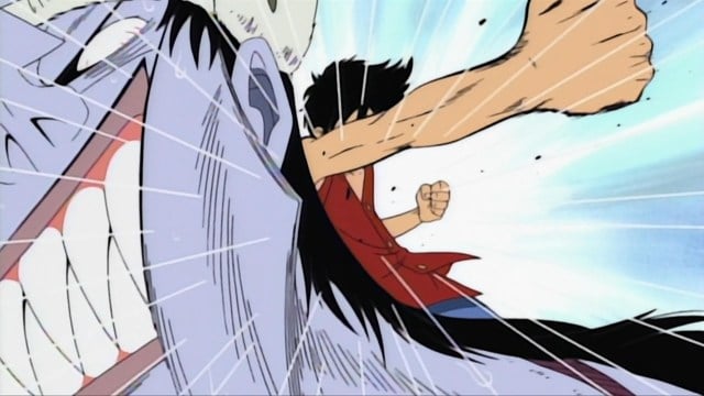 Luffy punching Arlong in One Piece