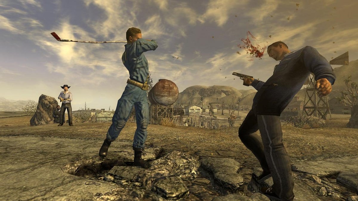 Fallout New Vegas: a vault sweller hits someone with a gold club out in the desert.