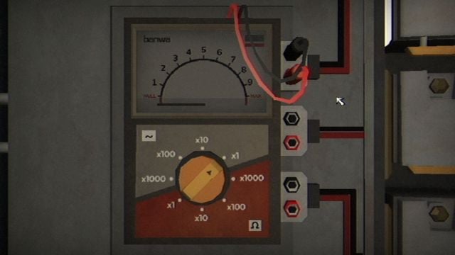 The left side of the fuse box revealing a dial, a meter, and three plug sockets.