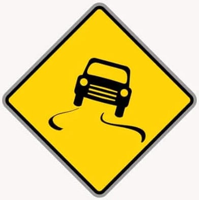 Slippery When Wet road sign in the BitLife driving test