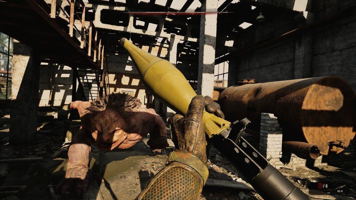 A fallen enemy on-screen while the player reloads an RPG in Stalker 2: Heart of Chornobyl