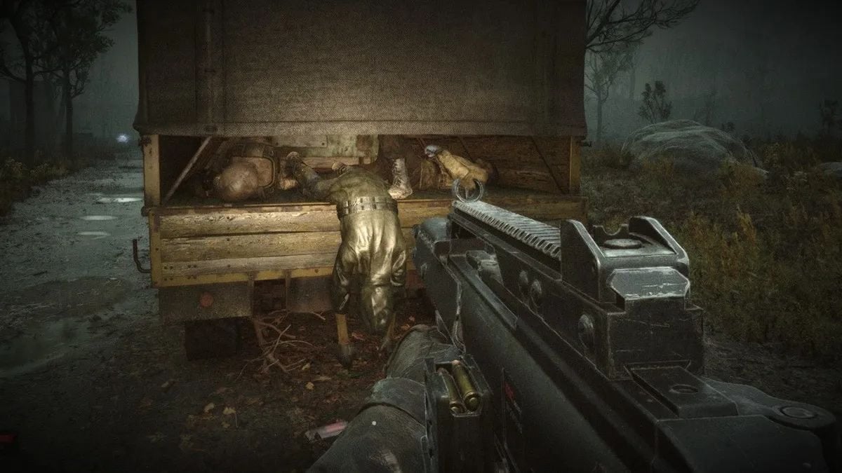 The player discovers a truck with bodies in Stalker 2, a game being lauded as game of the year by certain individuals.