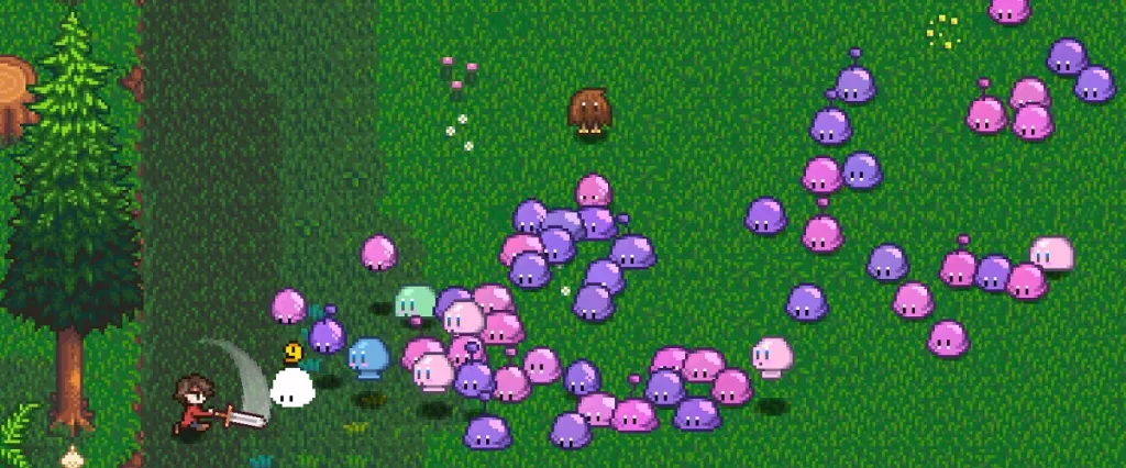 Haunted Chocolatier: a green field with purple and pink slime things bouncing around.