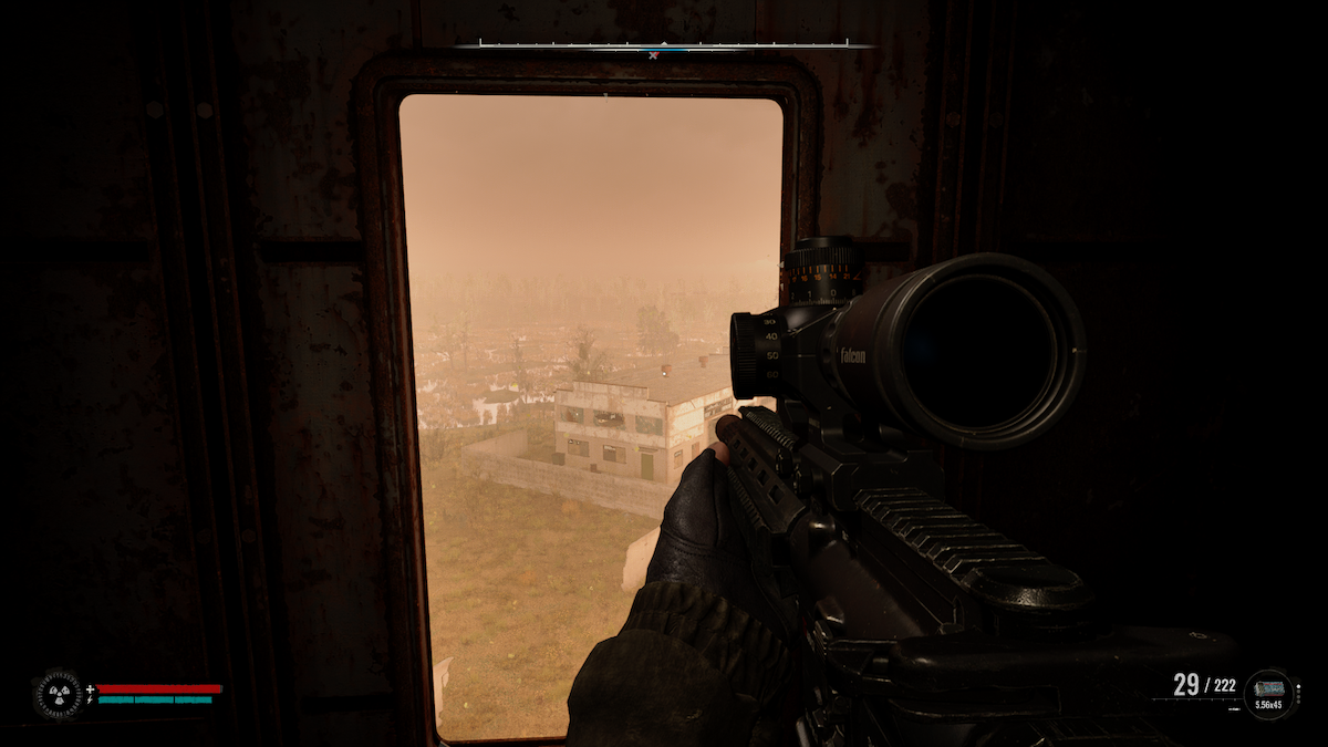 An image of Stalker 2's lead Skif holding the Clusterfuck rifle, in a sniper's nest at the top of a high tower.