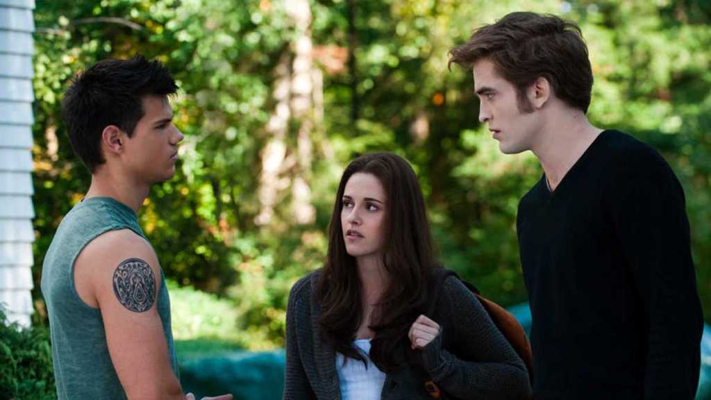 Taylor Lautner, Kristen Stewart, and Robert Pattinson in the Twilight movies
