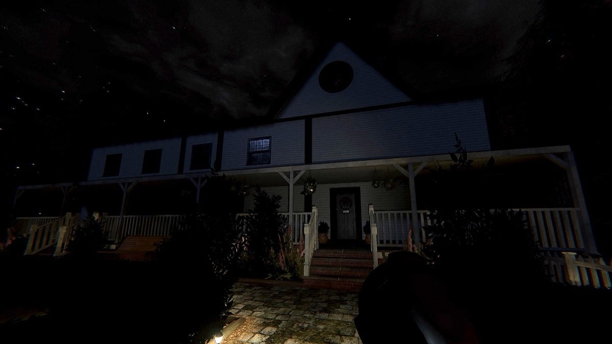 Phasmophobia: a dark exterior shot of the new Bleasdale Farmhouse map.